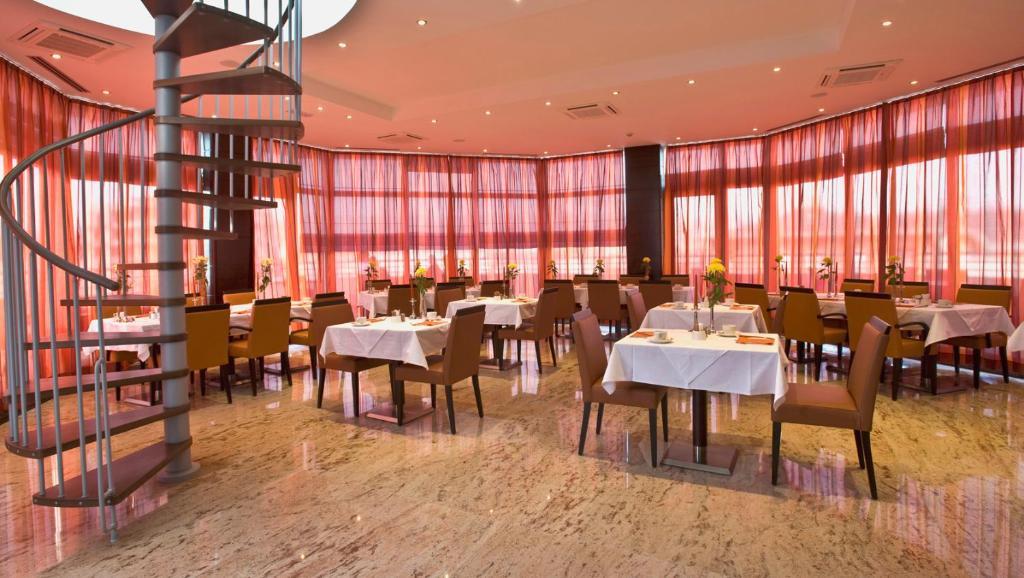 بودغوريتْسا Aparthotel Premier المطعم الصورة